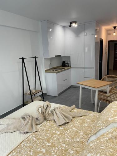 Ένα ή περισσότερα κρεβάτια σε δωμάτιο στο 2loft moderno acogedor centrico y silencioso