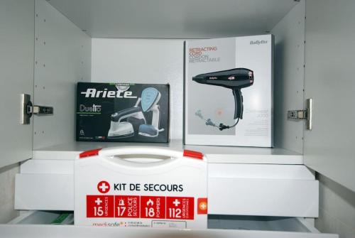 a display in a store with a wiidisc seasons sign at Studio - Confort - Climatisé - Le Refuge de Charles - Jardin in Bures-sur-Yvette