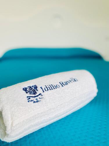 a white towel sitting on top of a blue table at Idillioravello in Ravello