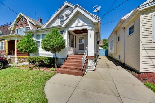 a white house with a white door and stairs at about 8 Mi From Canalside! Buffalo Vacation Rental in Buffalo