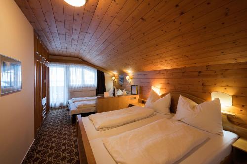 Postel nebo postele na pokoji v ubytování Landhaus Hubertus
