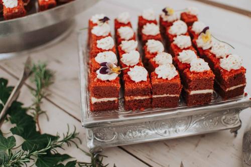 a red velvet cake on a plate on a table at Upington African Vineyard Boutique Hotel & SPA in Kanoneiland