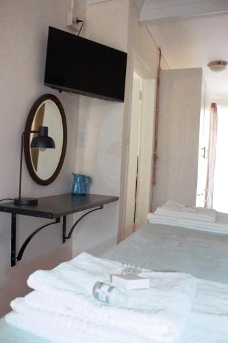 Ένα ή περισσότερα κρεβάτια σε δωμάτιο στο Accommodation at Potch Guesthouse
