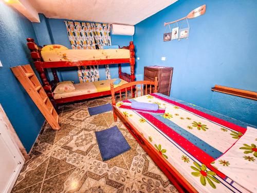 Postel nebo postele na pokoji v ubytování Posada Hostel Adri
