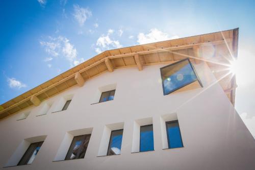 a building with windows and the sky in the background at N6 Oberstdorf in Oberstdorf