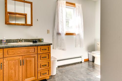 a bathroom with a sink and a toilet at Vermont Vacation Rental about 11 Mi to Lake Willoughby in East Charleston