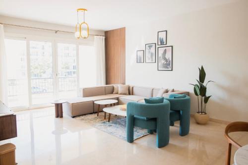 Гостиная зона в Mivida Emaar - Residence by Elegant Hospitality