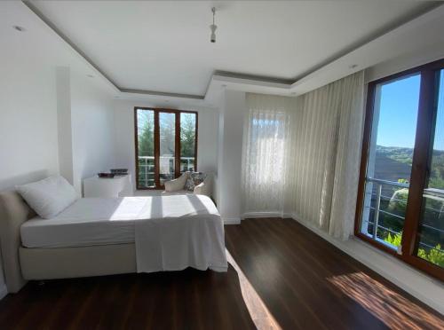 Letto o letti in una camera di Wonderful Villa Airport 5 minutes