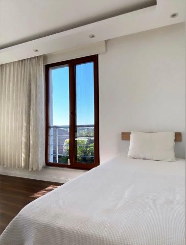 Letto o letti in una camera di Wonderful Villa Airport 5 minutes