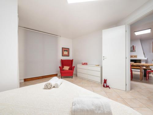 Ένα ή περισσότερα κρεβάτια σε δωμάτιο στο Sant'Anastasia Home Quartu Sant'Elena