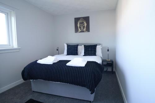 Postel nebo postele na pokoji v ubytování McCracken House