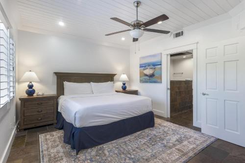 a bedroom with a bed and a ceiling fan at Tivoli 5228 G in Destin