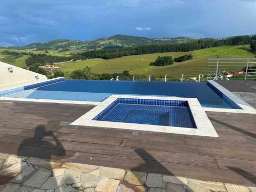 Bazén v ubytování Chácara em Socorro SP nebo v jeho okolí