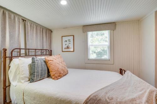 a bedroom with a bed with pillows and a window at Idyllic Camden Hideaway 1 Mi to Kentucky Lake in New Johnsonville