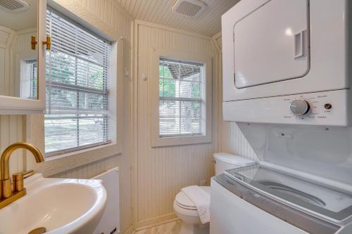 a small bathroom with a sink and a toilet at Idyllic Camden Hideaway 1 Mi to Kentucky Lake in New Johnsonville