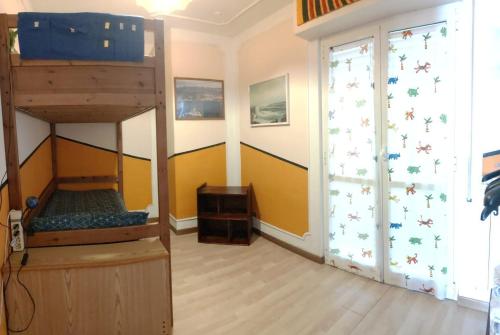 Poschodová posteľ alebo postele v izbe v ubytovaní La Casa di Flavio Casa Vacanze