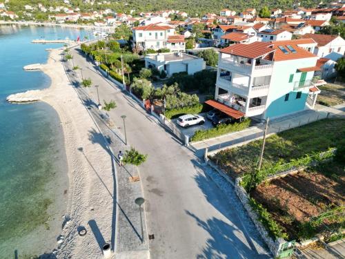 an aerial view of a beach and houses at Villa Luce in Vinišće