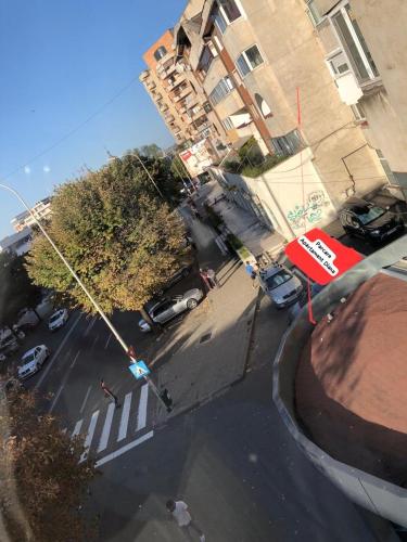 an aerial view of a city street with cars parked at Apartament Diana in Tulcea