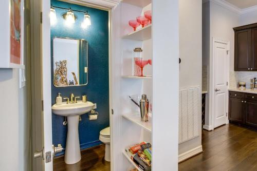 a bathroom with a sink and a toilet at Houston Home with Rooftop Patio Less Than 1 Mi to Aquarium! in Houston