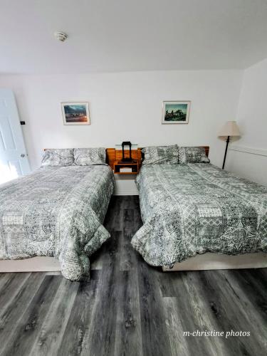 Postel nebo postele na pokoji v ubytování Motel Bonsoir