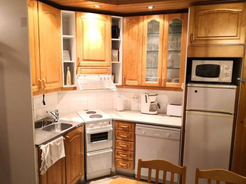 Kuchyň nebo kuchyňský kout v ubytování Ruka Kuukkeli, one bedroom + loft