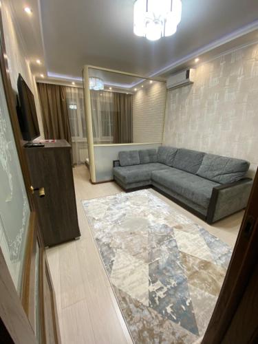 Ein Sitzbereich in der Unterkunft 1 комнатная квартира в элитном ЖК Альтаир со всеми удобствами