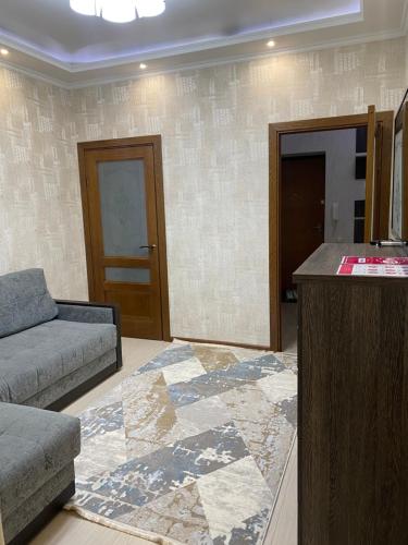 Ein Sitzbereich in der Unterkunft 1 комнатная квартира в элитном ЖК Альтаир со всеми удобствами