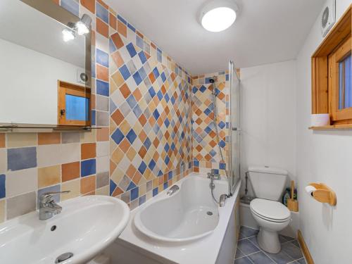 a bathroom with a sink and a toilet at Chalet familial cosy pour 8 pers. près des pistes et commodités à Courchevel Le Praz - FR-1-568-44 in Courchevel