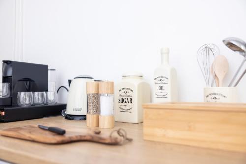 a kitchen counter with products on a counter top at #2 SUPERIOR! Nespresso - Küche - Prime - Parken in Duisburg