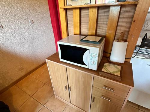 Photo de la galerie de l'établissement Studio cabine cosy, balcon sud, parking, Wi-Fi, près des pistes et randonnées - FR-1-515-183, à Villard-de-Lans