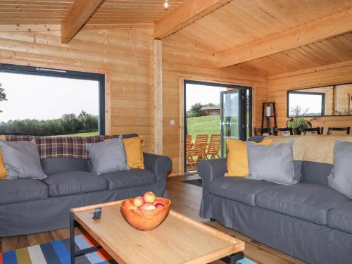 Χώρος καθιστικού στο Foxglove Lodge
