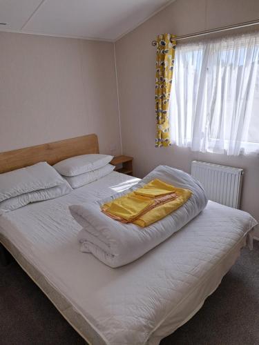 Postel nebo postele na pokoji v ubytování Sealgulls Rest