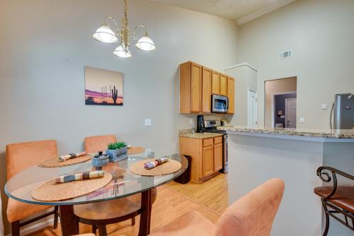 a kitchen and dining room with a table and chairs at Inviting Austell Home 14 Mi to Downtown Atlanta! in Austell