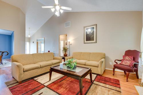 a living room with two couches and a coffee table at Inviting Austell Home 14 Mi to Downtown Atlanta! in Austell