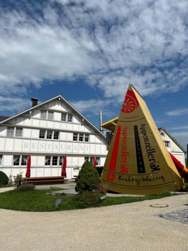 a sail boat sitting in front of a building at Ferienwohnung in Stein AR in Stein