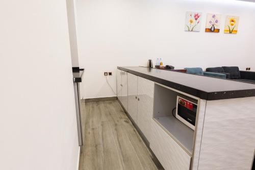 Η κουζίνα ή μικρή κουζίνα στο فندق روزالينا