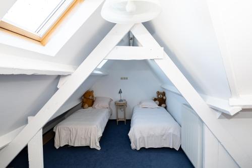 Cama o camas de una habitación en De Boter Villa