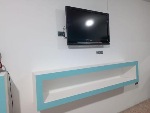 Hotel Posada Los Faroles Atlixcoにあるテレビまたはエンターテインメントセンター