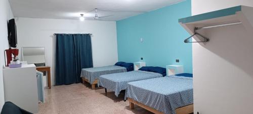 Hotel Posada Los Faroles Atlixcoにあるテレビまたはエンターテインメントセンター