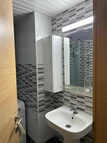 Vannituba majutusasutuses Urban City Apartment