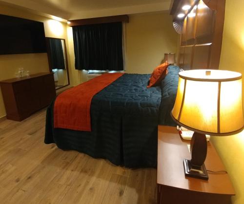 Postel nebo postele na pokoji v ubytování Hotel Marques de Cima