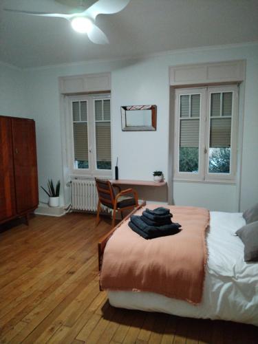 Ένα ή περισσότερα κρεβάτια σε δωμάτιο στο Maison Diderot
