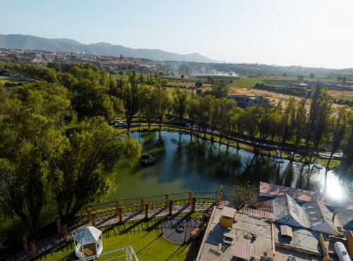 an aerial view of a river with a bridge at BTH Hotel Arequipa Lake in Arequipa
