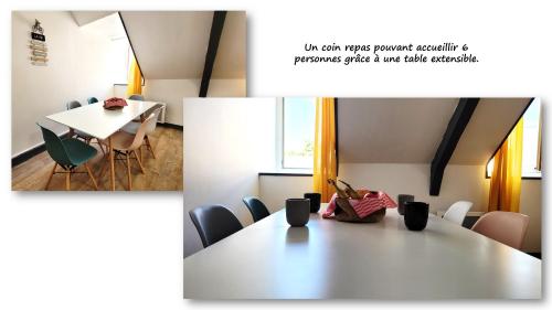 uma sala de reuniões com mesa e cadeiras em Sous les toits – tout confort em Saint-Brieuc