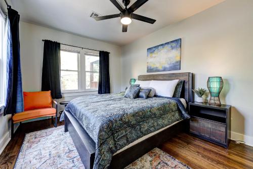 a bedroom with a bed and a ceiling fan at Putnam Pad II - City card 4 local biz discount in Oklahoma City