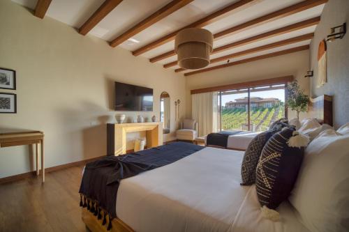 Katil atau katil-katil dalam bilik di Emmalu Hotel Boutique