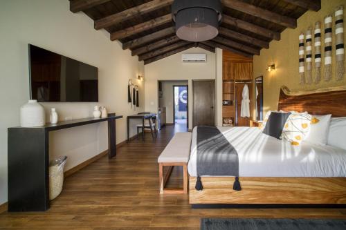 Katil atau katil-katil dalam bilik di Emmalu Hotel Boutique