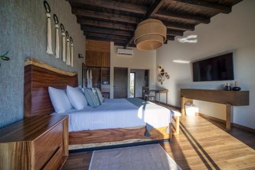 Katil atau katil-katil dalam bilik di Emmalu Hotel Boutique