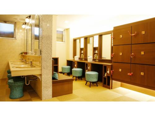 a bathroom with a sink and a mirror at Hamachiyokan - Vacation STAY 56027v in Ise