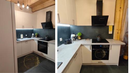 a kitchen with white cabinets and a black dishwasher at Chwilo Trwaj dom z jacuzzi i kominkiem z widokiem na góry Korbielów Pilsko in Korbielów